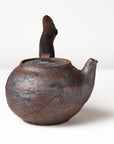 Side handle tea pot with wooden handle on white background. side view