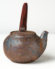 side handle tea pot with wooden handle on white background, side view