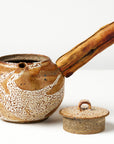 side habndle shino tapot front view with lid off